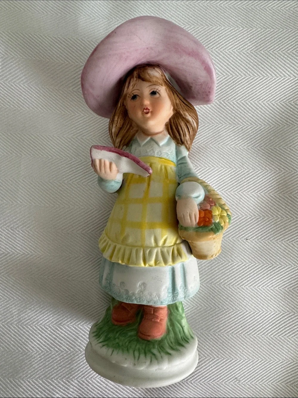 Hand-Painted Girl Figurine in Pink Hat and Yellow Apron - Unbranded